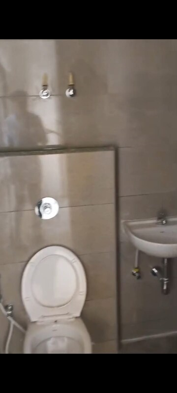 Bathroom in 3 BHK Apartment at Shilp Revanta, Shela – for Rent