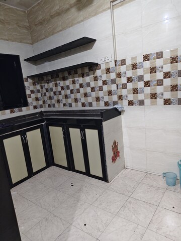 Kitchen in 1 BHK Apartment at Deepanjali CHS, Malad West – for Rent
