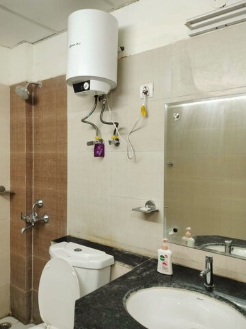 Bathroom in 4 BHK Apartment at Ramprastha Awho, Sector 95 – for Rent