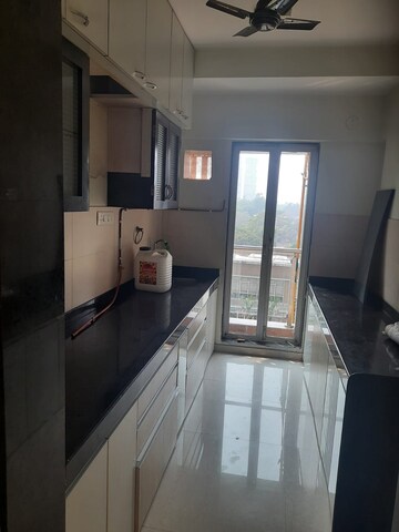 Kitchen in 2 BHK Apartment at Hubtown Greenwoods, Vartak Nagar – for Sale
