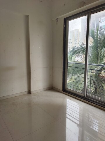 Room in 1 BHK Apartment at Omkar Signet, Malad East – for Rent