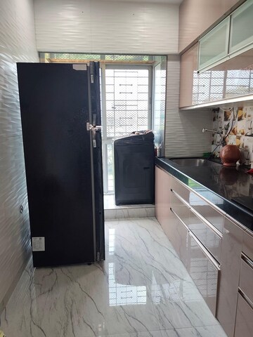 Kitchen in 2 BHK Apartment at Pranav Silverene CHS, Malad West – for Rent