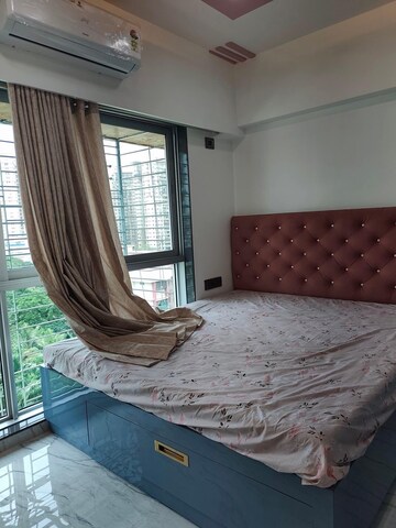 Bedroom in 2 BHK Apartment at Pranav Silverene CHS, Malad West – for Rent