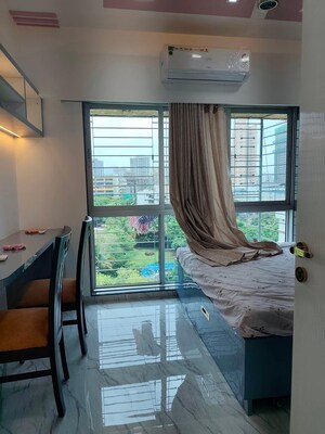 Bedroom in 2 BHK Apartment at Pranav Silverene CHS, Malad West – for Rent
