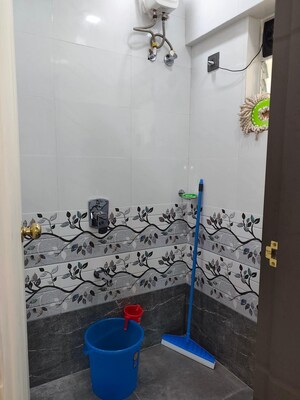 Bathroom in 2 BHK Apartment at Pranav Silverene CHS, Malad West – for Rent