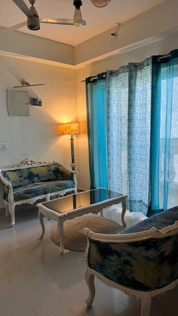 Living Room in 3 BHK Apartment at Antriksh Golf View, Sector 78 – for Rent