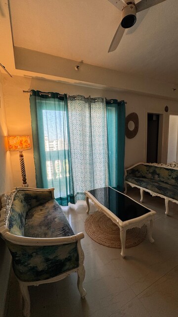 Living Room in 3 BHK Apartment at Antriksh Golf View, Sector 78 – for Rent