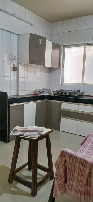 Kitchen in 2 BHK Apartment at Sun City, Sinhagad Road – for Rent