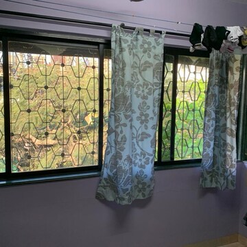 Living Room in 1 BHK Apartment at Amboli – for Sale