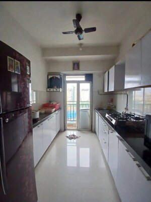 Kitchen in 3 BHK Apartment at Conwood Enclave, Vasant Vihar – for Rent