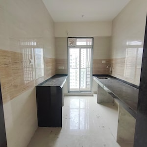 Kitchen in 1 BHK Apartment at Puranik Rumah Bali, Ghodbunder Road – for Rent