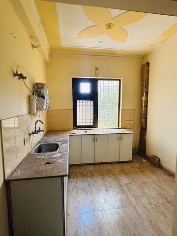 Living Room in 1.5 BHK Builder Floor at Sector 10a – for Rent