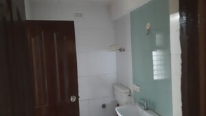 Bathroom in 2 BHK Apartment at NK Sharma Savitry Greens 2, Ghazipur – for Rent
