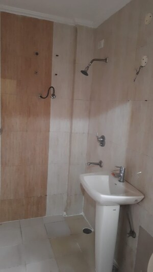 Bathroom in 2 BHK Apartment at NK Sharma Savitry Greens 2, Ghazipur – for Rent