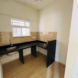 Kitchen in 1 BHK Apartment at VTP Beaumonde, Awhalwadi – for Sale