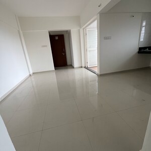 Living Room in 1 BHK Apartment at Wadgaon Sheri – for Sale