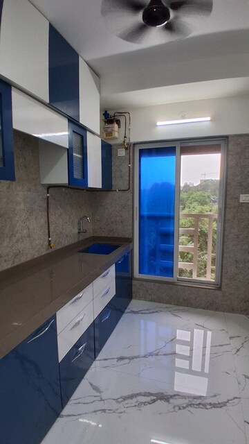Kitchen in 1 BHK Apartment at Rishabraj Sujai, Malad East – for Rent