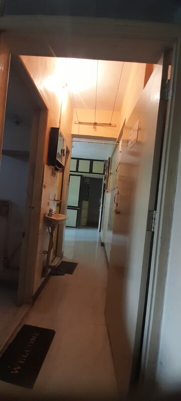 Building Lobby in 1 BHK Apartment at Sai Baba Complex, Aarey Colony – for Rent