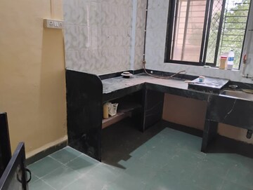 Kitchen in 2 BHK Apartment at Aboli Estate, Dombivli East – for Sale
