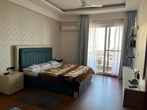 Bedroom in 4 BHK Builder Floor at Ansal API Esencia Wood Winds, Sector 67 – for Sale