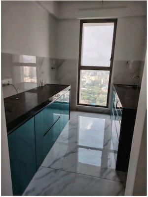 Kitchen in 2 BHK Apartment at Raymond Ten X Habitat, Pokhran Road No Two – for Rent