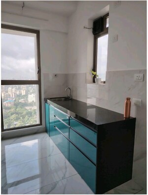 Kitchen in 2 BHK Apartment at Raymond Ten X Habitat, Pokhran Road No Two – for Rent