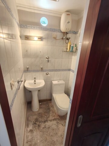 Bathroom in 3 BHK Builder Floor at Kalkaji – for Rent