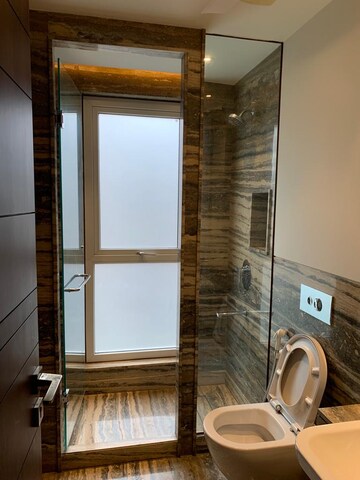 Bathroom in 4 BHK Builder Floor at Boutique Residential Apartments A-10, Gulmohar Park – for Rent