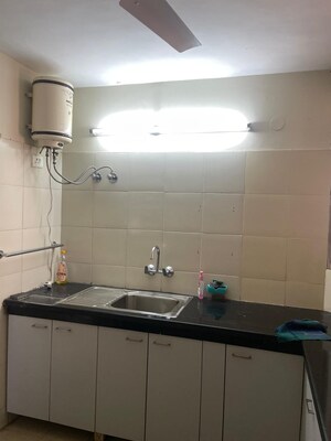 Kitchen in 2 BHK Apartment at Ansal Sushant Apartments, Sushant Lok I – for Rent