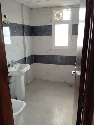 Bathroom in 2 BHK Apartment at Gaurs Cascades, Raj Nagar Extension – for Rent