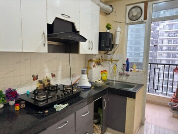Kitchen in 2 BHK Apartment at Gaurs Cascades, Raj Nagar Extension – for Rent