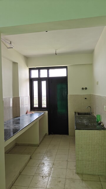 Kitchen in 2 BHK Apartment at RAS Palm Residency, Sector 76 – for Sale