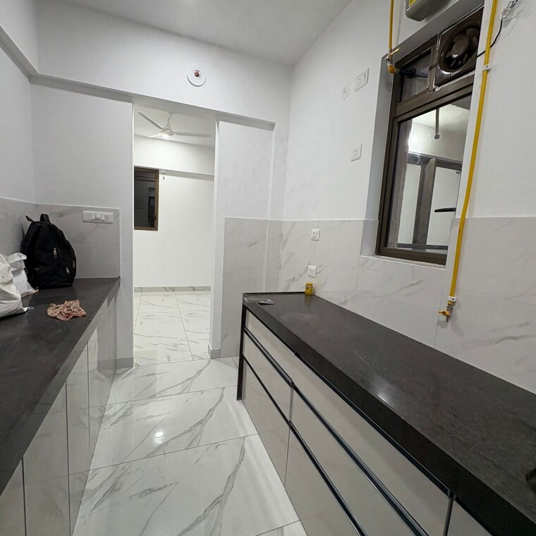 Kitchen, raymond-realty-phase-ii 2 Bedroom 635 Sq.Ft. Apartment In Swastik Garden Thane 9261549