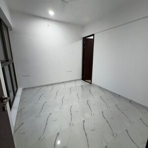 Bedroom in 2 BHK Apartment at Raymond Realty Phase II, Swastik Garden – for Rent