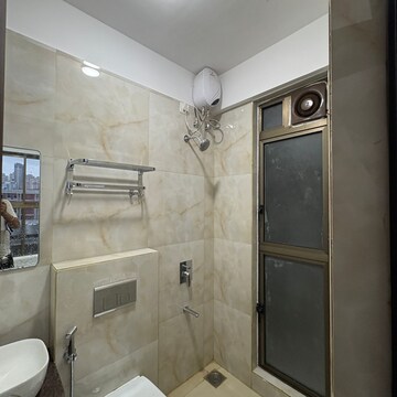 Bathroom in 2 BHK Apartment at Raymond Realty Phase II, Swastik Garden – for Rent