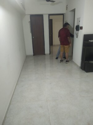 Living Room in 1 BHK Apartment at Lodha Amara, Kolshet Road – for Rent