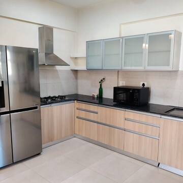 Kitchen in 2 BHK Apartment at Gera Song Of Joy, Kharadi – for Rent
