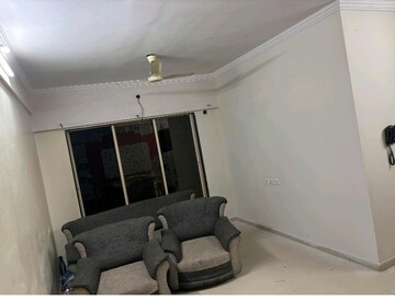Living Room in 2 BHK Apartment at Bhoomi Acres, Waghbil – for Rent