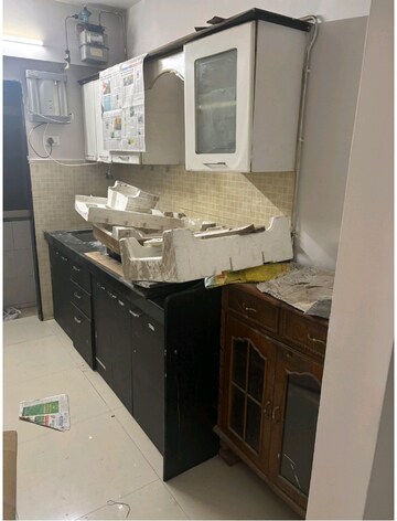 Kitchen in 2 BHK Apartment at Bhoomi Acres, Waghbil – for Rent