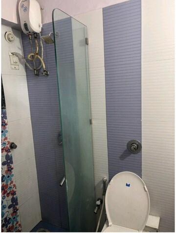 Bathroom in 2 BHK Apartment at Bhoomi Acres, Waghbil – for Rent