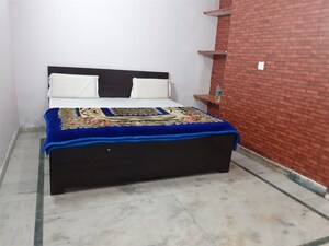 Bedroom in 6+ BHK Independent House at RWA Apartments, Sector 31 – for Rent