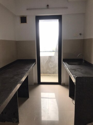 Kitchen in 1 BHK Apartment at Lodha Palava Downtown, Dombivli East – for Sale