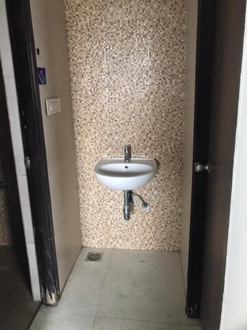 Bathroom in 1 BHK Apartment at Lodha Palava Downtown, Dombivli East – for Sale