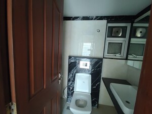 Bathroom in 3 BHK Apartment at DF Silverline Queens Terraces, Shivaji Nagar – for Sale