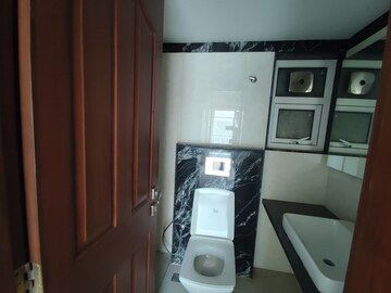 Bathroom in 3 BHK Apartment at DF Silverline Queens Terraces, Shivaji Nagar – for Sale
