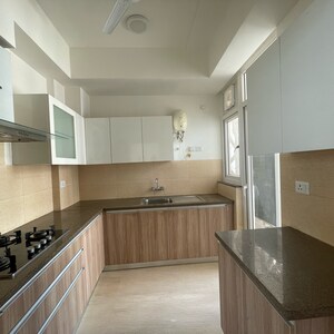 Kitchen in 3 BHK Apartment at Puri Emerald Bay, Dhanwapur – for Rent