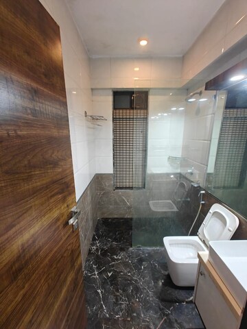 Bathroom in 4 BHK Apartment at DLH Sorrento, Veera Desai Road – for Rent