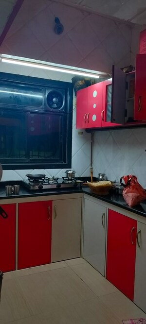 Kitchen in 1 RK Apartment at Panchratna CHS, Juinagar – for Sale
