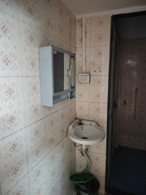 Bathroom in 1 BHK Apartment at Kasturba Housing Society, Vishrantwadi – for Rent