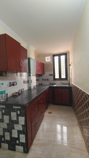 Kitchen in 2 BHK Builder Floor at Palm Residency Chhatarpur, Chattarpur – for Rent